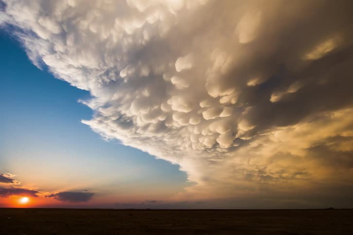 A time lapse of a sunset and clouds