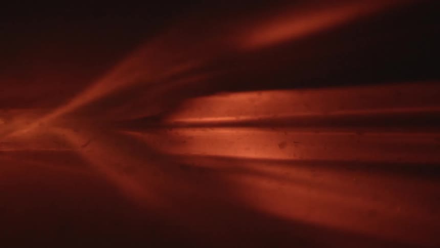 Abstract footage of a bright light moving
