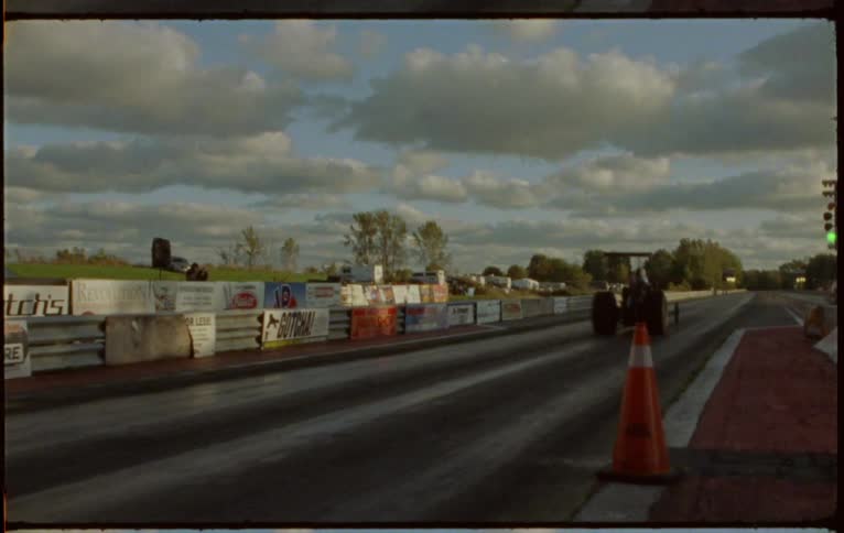 A race car takes off on a track