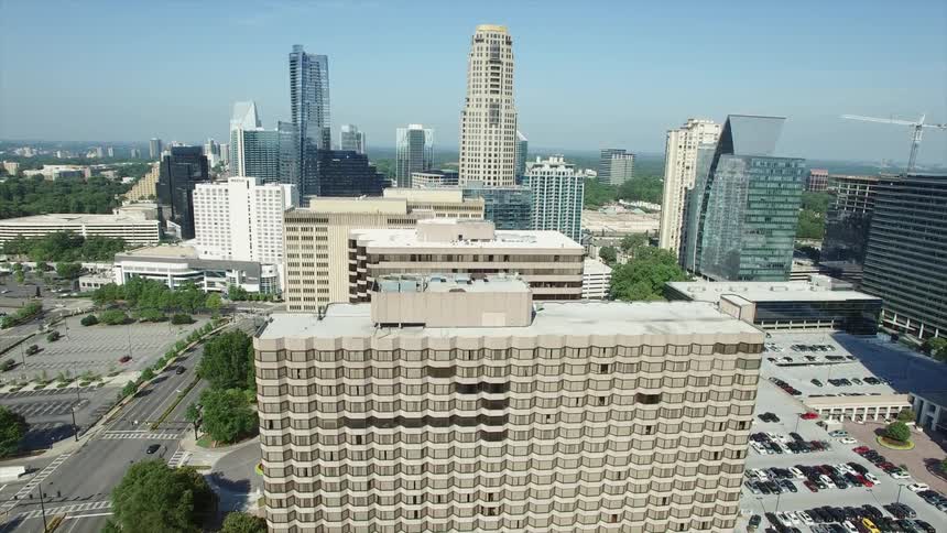 Moving up to get a view of a row of buildings in a city