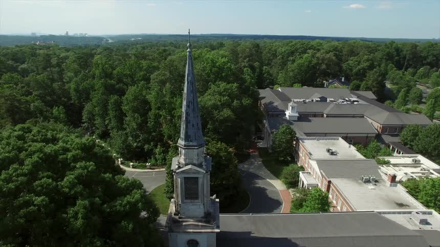 Aerial view of a building with a tower