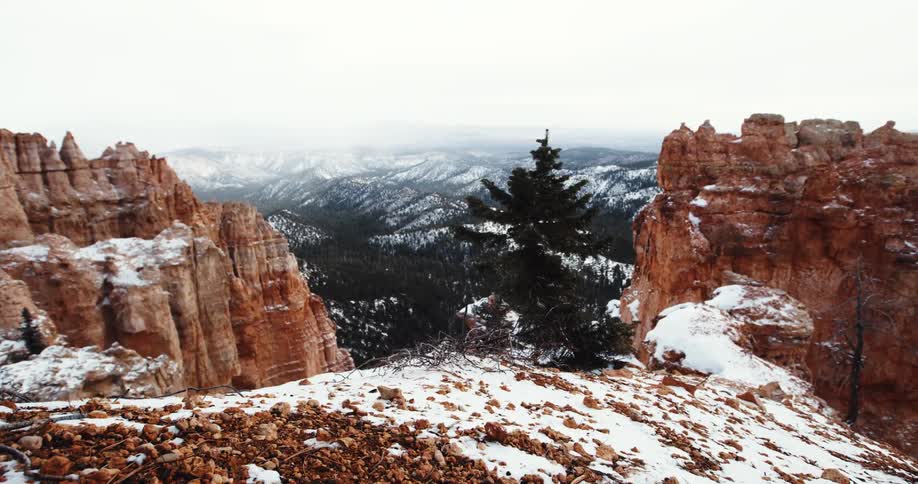 An aerial view of a canyon in the winter