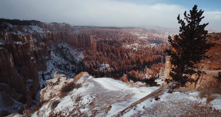 A wide shot of a cliffside canyon