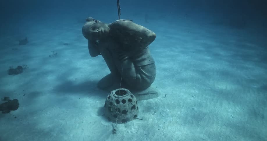 A statue on the bottom of the sea