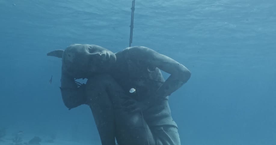 Ocean Atlas Underwater statue in the ocean at daytime