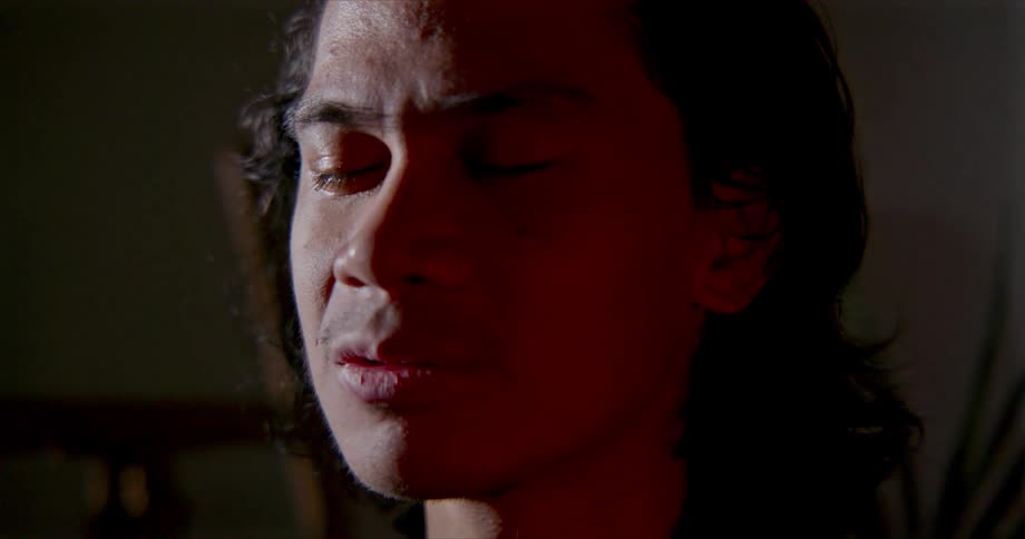 A man sitting and meditating