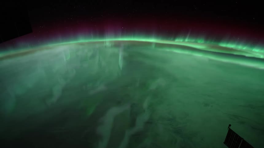 The aurora borealis shining over planet earth