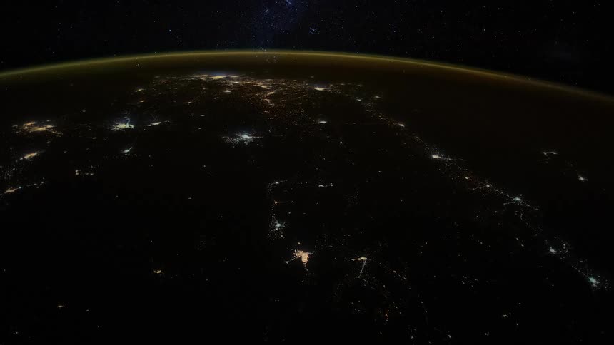 The planet earth with its atmosphere with space and stars in the background