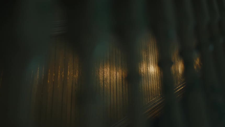 A banister on a staircase in a home
