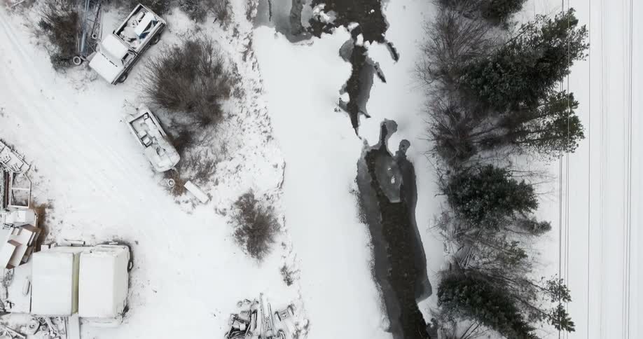 An aerial view of a snow covered landscape