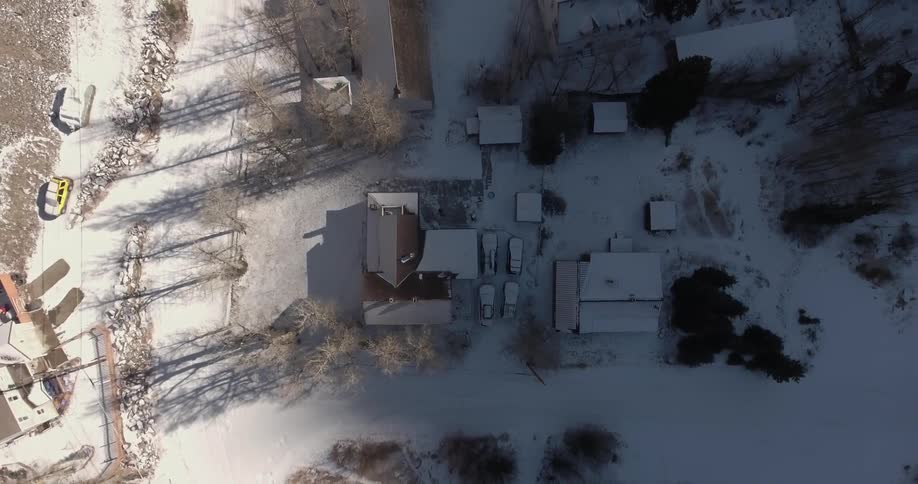 Overhead view of a snow-covered suburban area