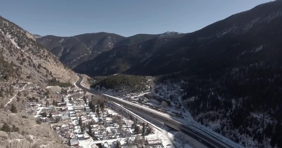 Traffic on a highway that passes through mountains