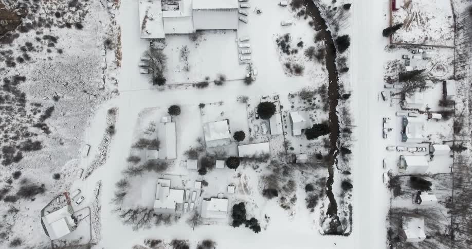 A snow covered village as seen from above