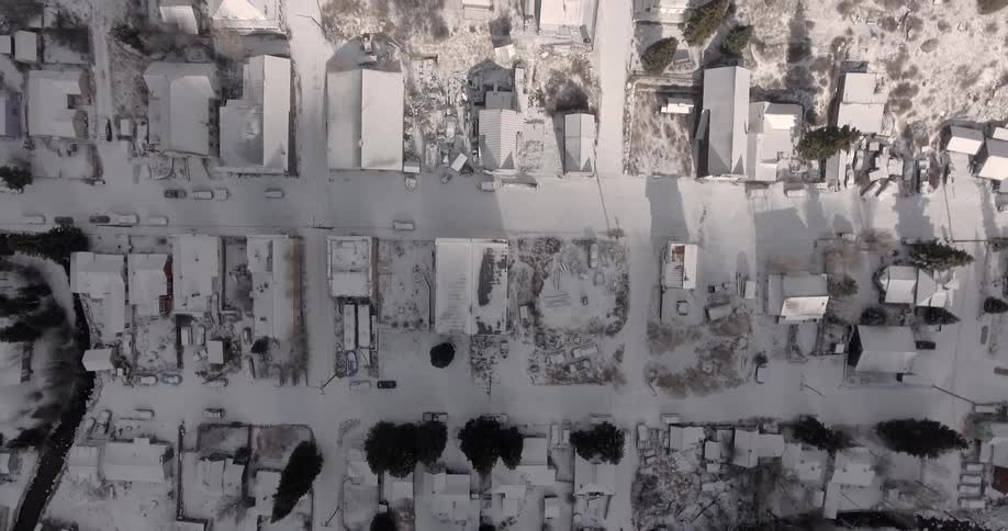 Black and white picture of buildings from directly overhead