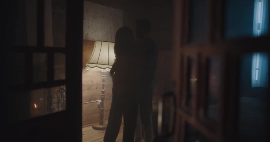 A man and woman dancing in a room