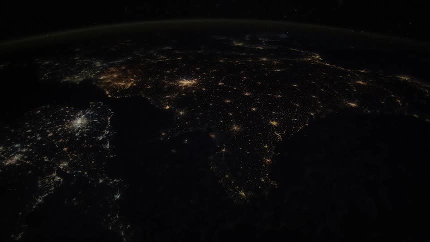 The planet earth with its atmosphere with space and stars in the background