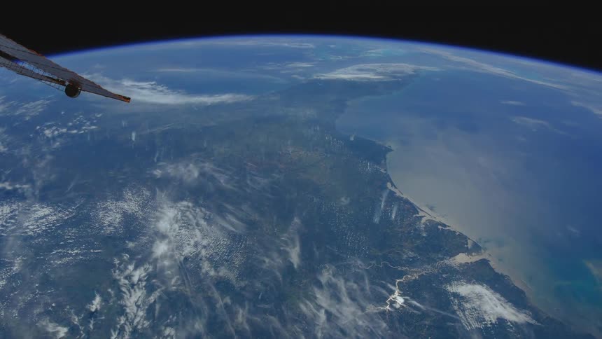The planet earth with clouds and atmosphere with space in the background