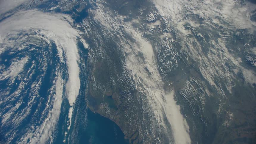 The planet earth with water clouds and atmosphere