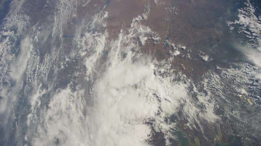 The planet earth with clouds and atmosphere