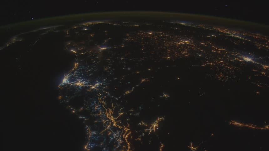 The planet earth with lights and atmosphere with space in the background