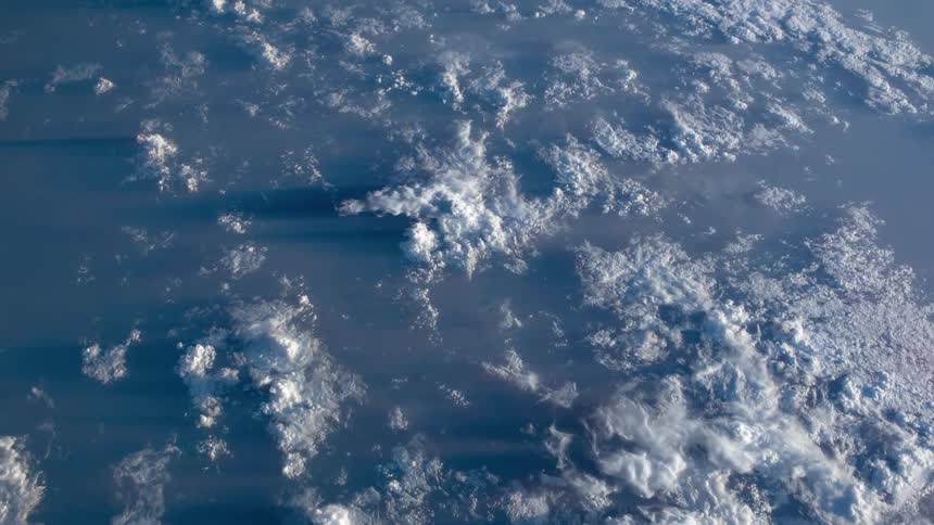 Clouds and ice contrast with ocean blues