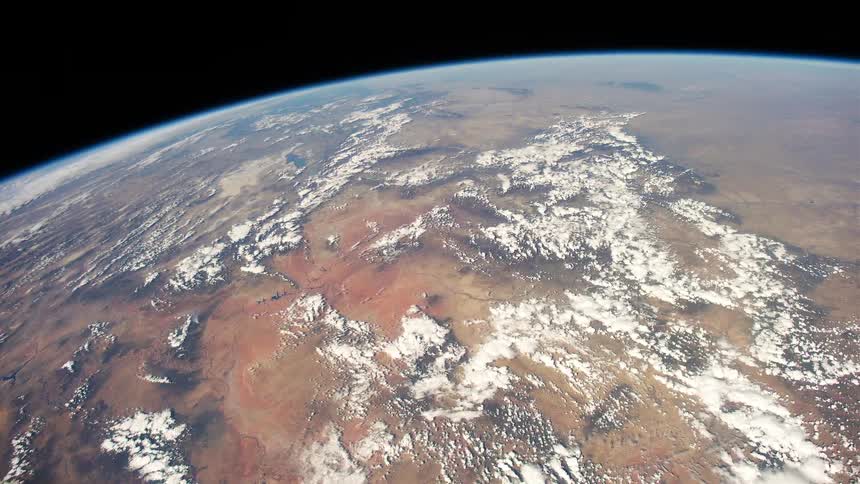A view of earth from space in the middle of the day