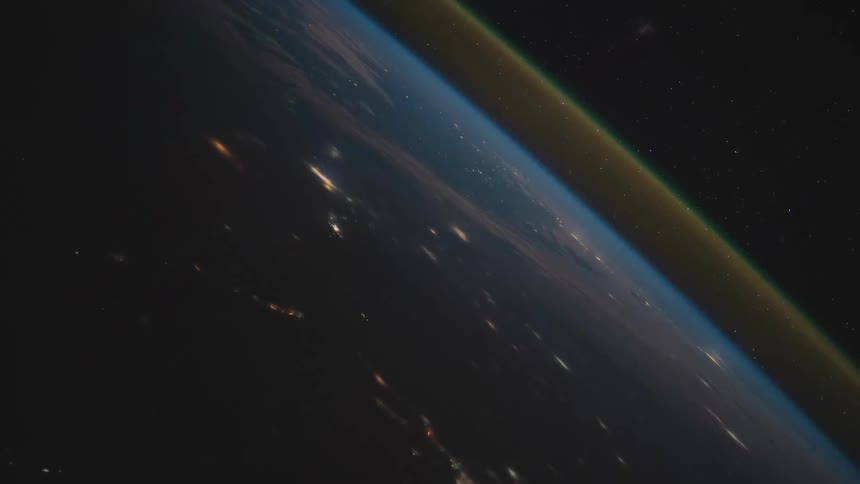 The planet earth with clouds lights and atmosphere with space and stars in the background