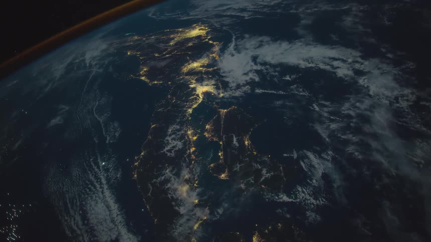 The planet earth with lights and atmosphere with space in the background