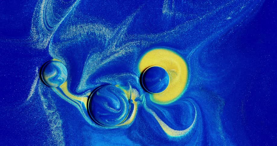 Colorful liquid and bubbles moving around
