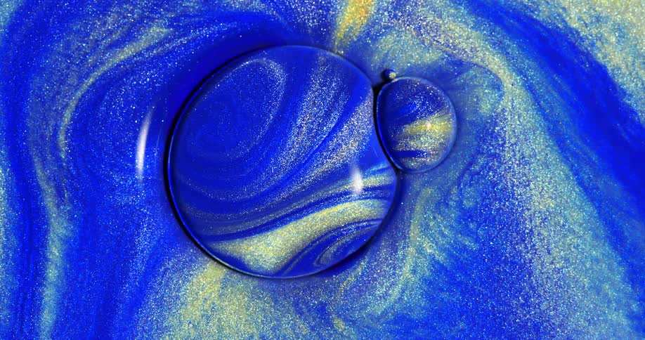 Paint swirls into a series of circular visual art