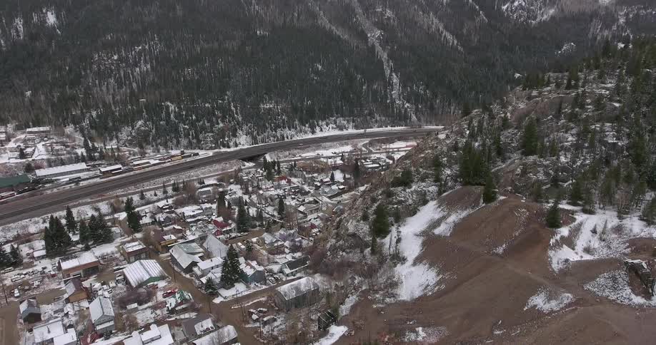 Aerial view of a hilly snow covered city