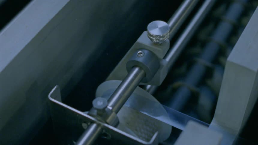 A machine with dials wheels and bars