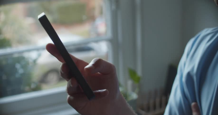 A man is talking on his phone with video