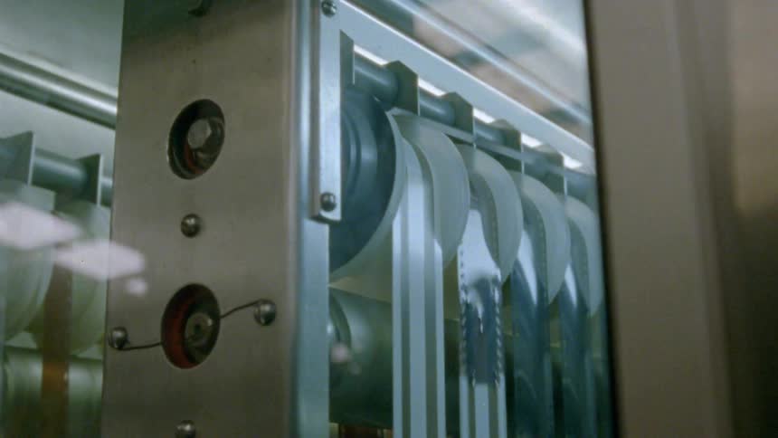 The wheels on the machine spin film