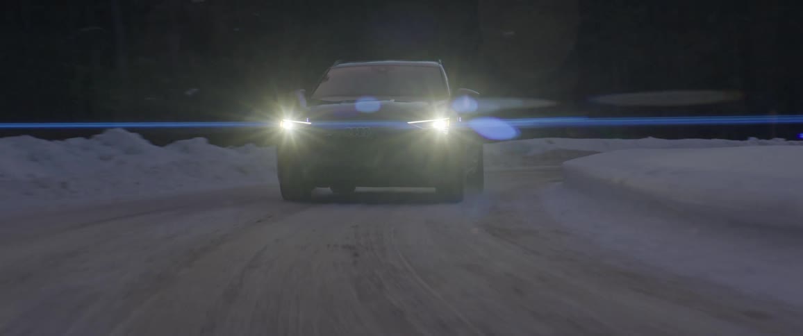 Car rides on a snowy road