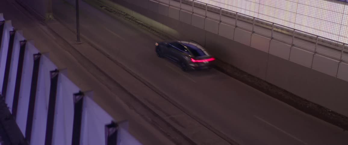 A car drives into the tunnel