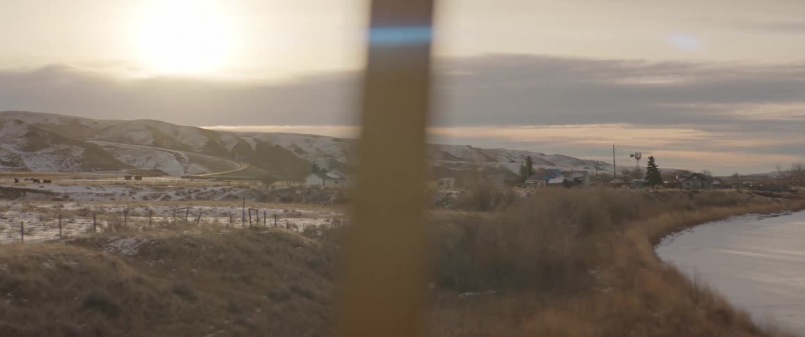 A view of a landscape from a bridge