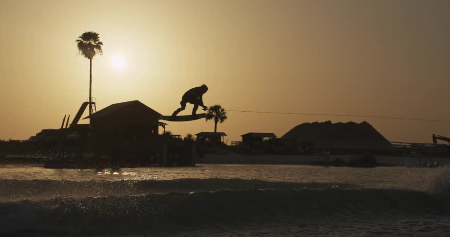 A man that is surfing on waves