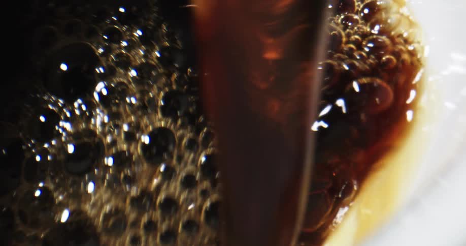 Coffee being poured in to a mug