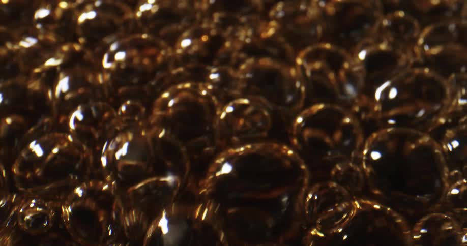 Close up of a bubbling brown caramelized liquid