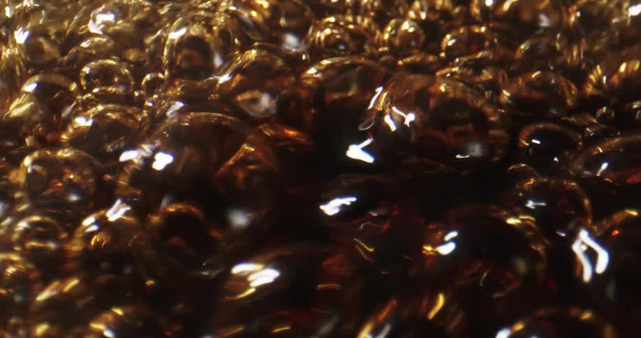 Brown gray and white colors that look like cola with bubbles