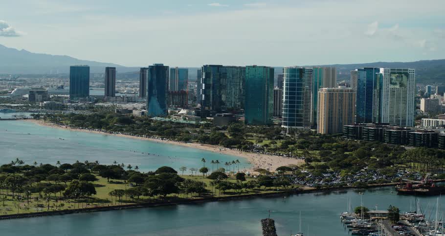An aerial view of a city next to the ocean