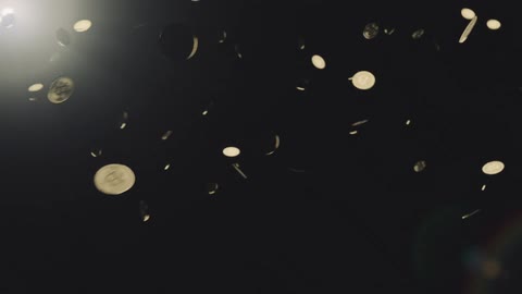 Bitcoin falling on a dark background