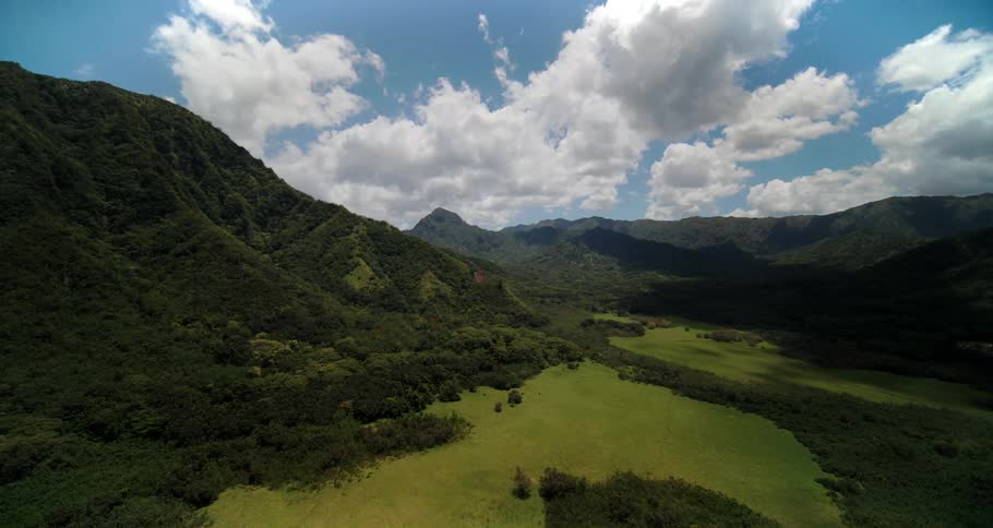 An aerial view of hills and valleys outdoors