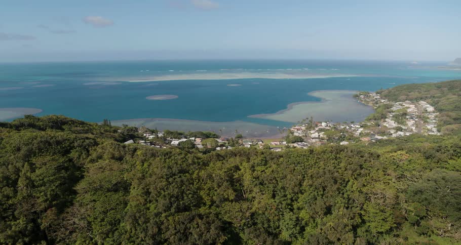 A view of a hill next to the ocean