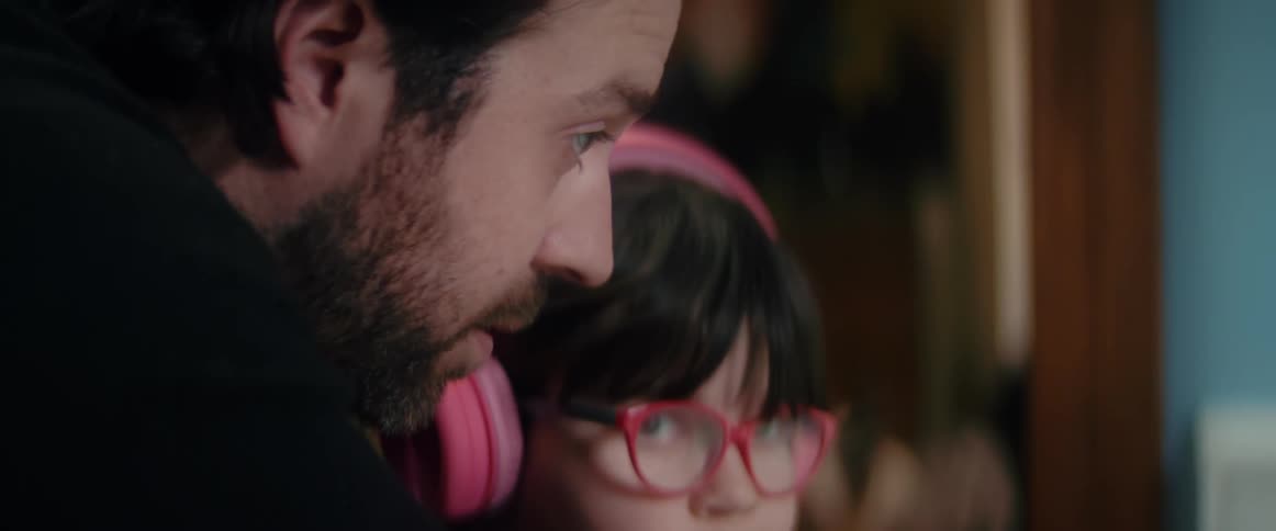 Daughter gesticulates wildly as father tries to help her with remote schoolwork