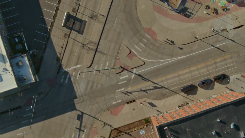 A city with streets buildings people and vehicles