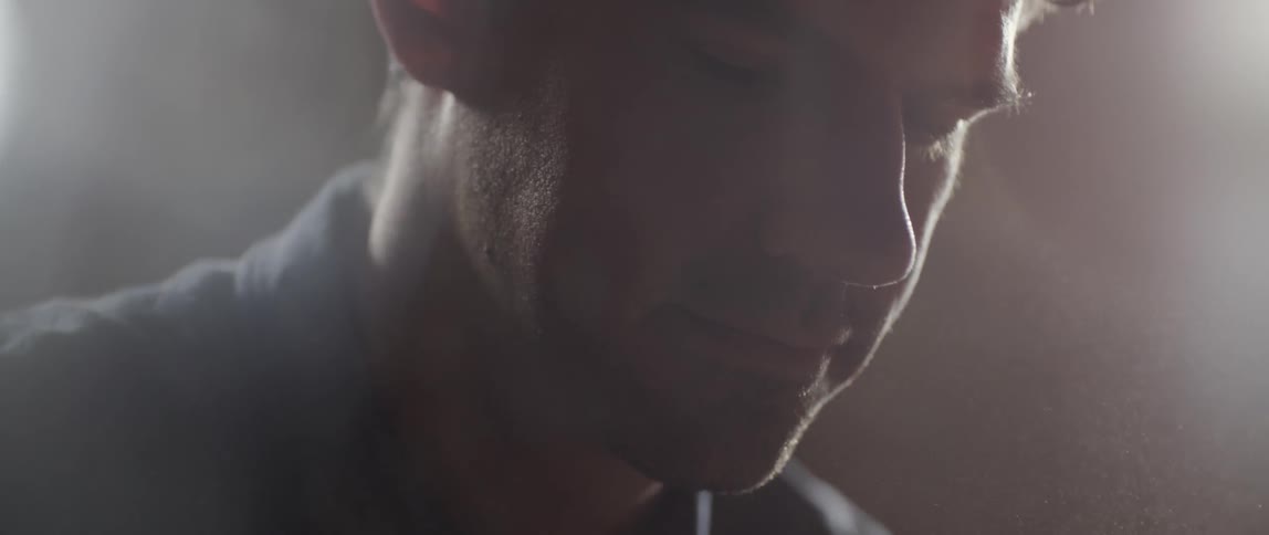 Close up of a man looking down