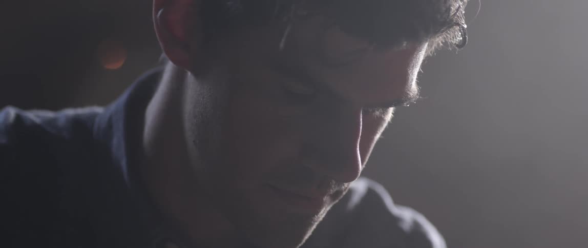 Close up of a man looking down