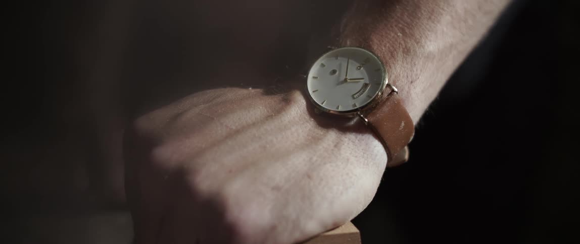 Close up of an arm and a watch